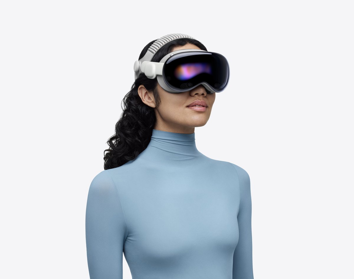 A person wearing an Apple Vision Pro headset, seen from the front.