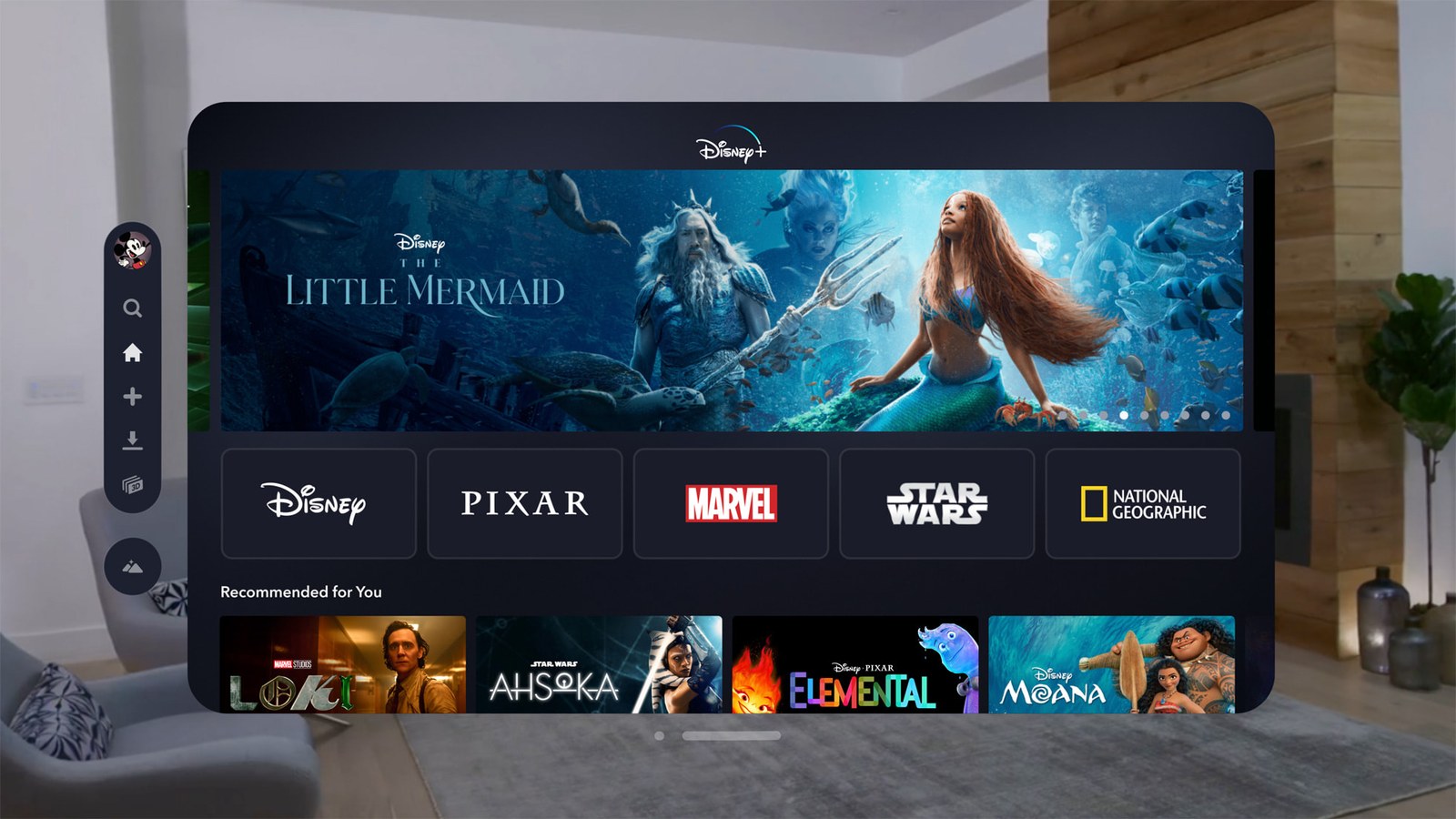 The Disney+ app in a window floating in a living room, as seen in Apple Vision Pro.