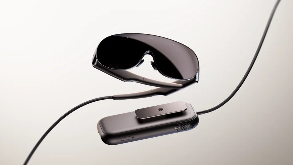 Meta VR Glasses floating above the unit they are cabled to.