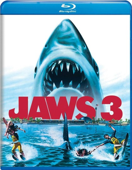 The Blu-ray case of Jaws 3: a shark with open jaws rising under a line of water-skiers.
