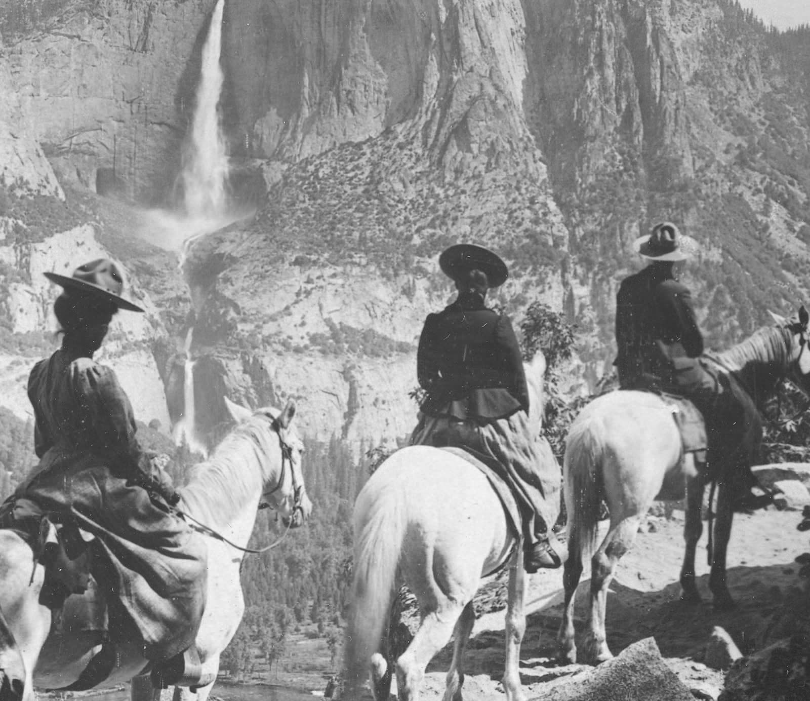 Riders on horseback facing Yosemite Falls, from a 1901 stereograph: the left eye's view