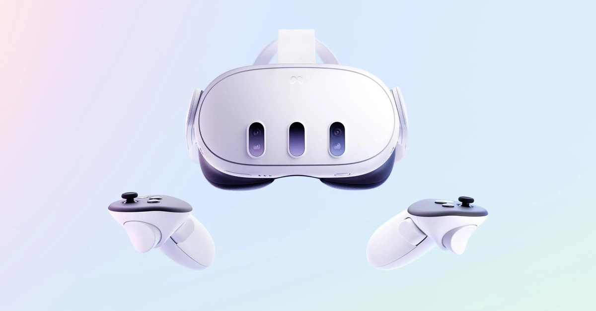 A white Meta Quest 3 headset with its two hand controllers.